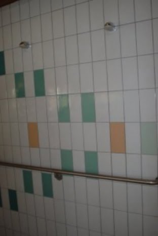 Onzichtbare knop om douche aan te zetten.